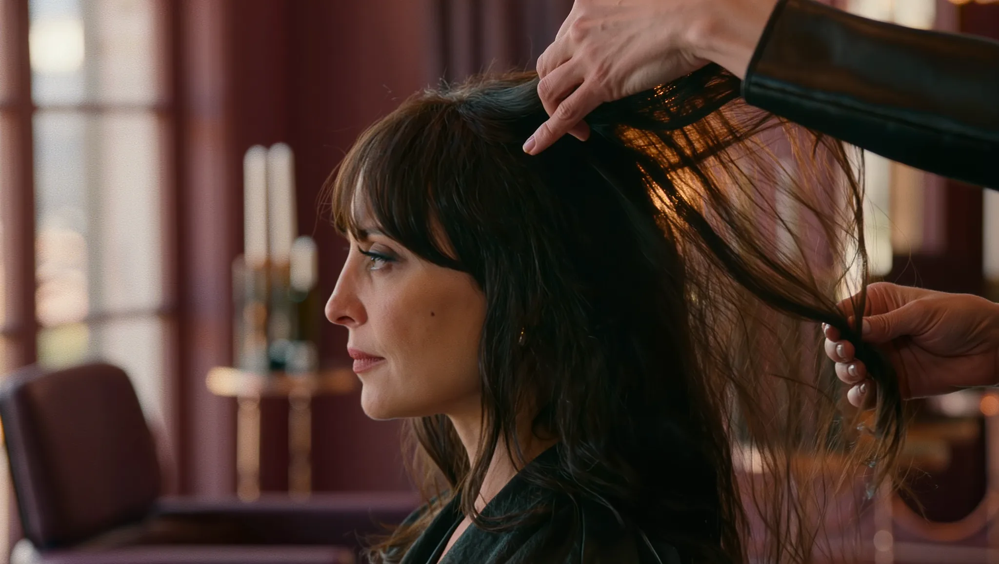 Flowing hair mid-styling in the NJS salon